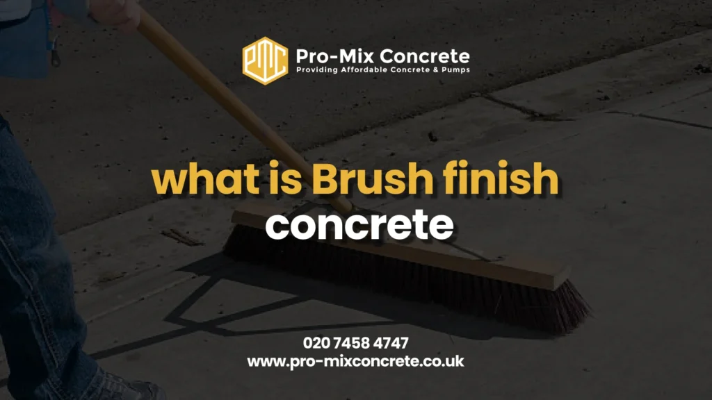 A low-angle, dark image of a person applying a brush finish to wet concrete using a wide push broom. The overlaid text asks, "what is Brush finish concrete".